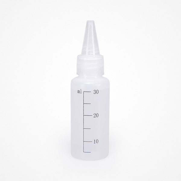 Flaconcino graduato da 30 ml in dotazione con la piastra Stylance